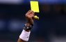 arbitro tarjeta amarilla